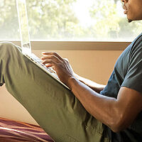 boy working laptop