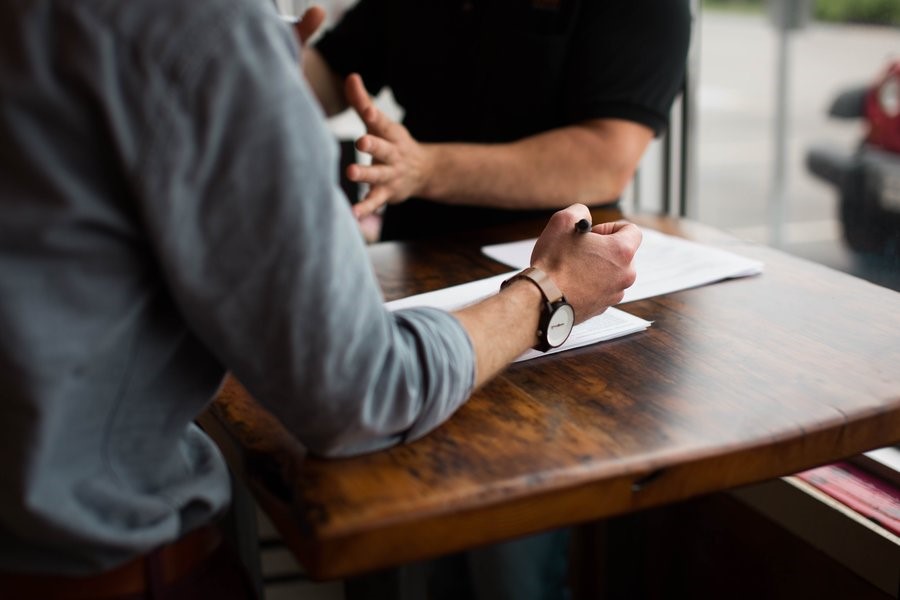 An employer and a graduate having an interview