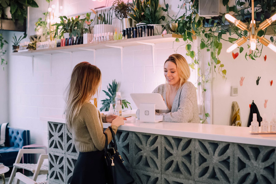 receptionist with customer