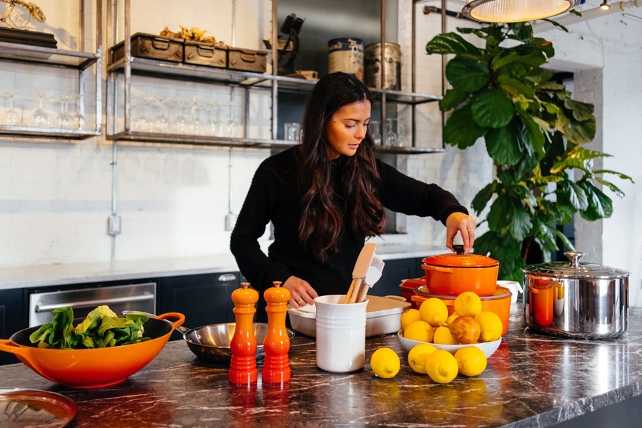 woman preparing healthy food in a kitchen